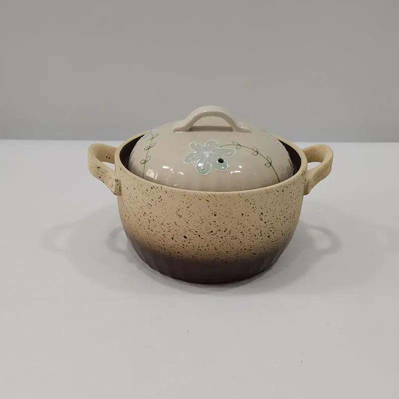 Hand drawn kiln turned clay pot